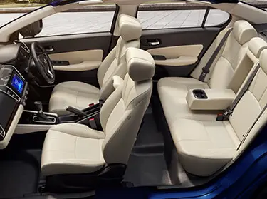 Honda City Sport Edition black multi-spoke alloy wheels and sporty grille close-up