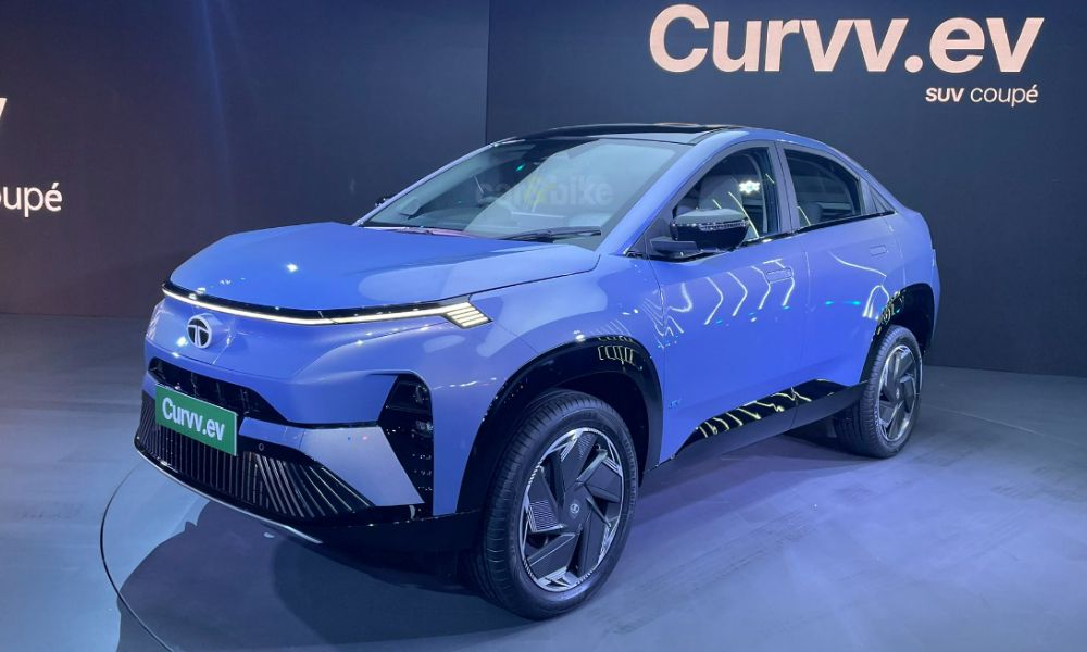 Tata Curvv.ev electric SUV coupé showcased at auto expo with futuristic design and aerodynamic styling
